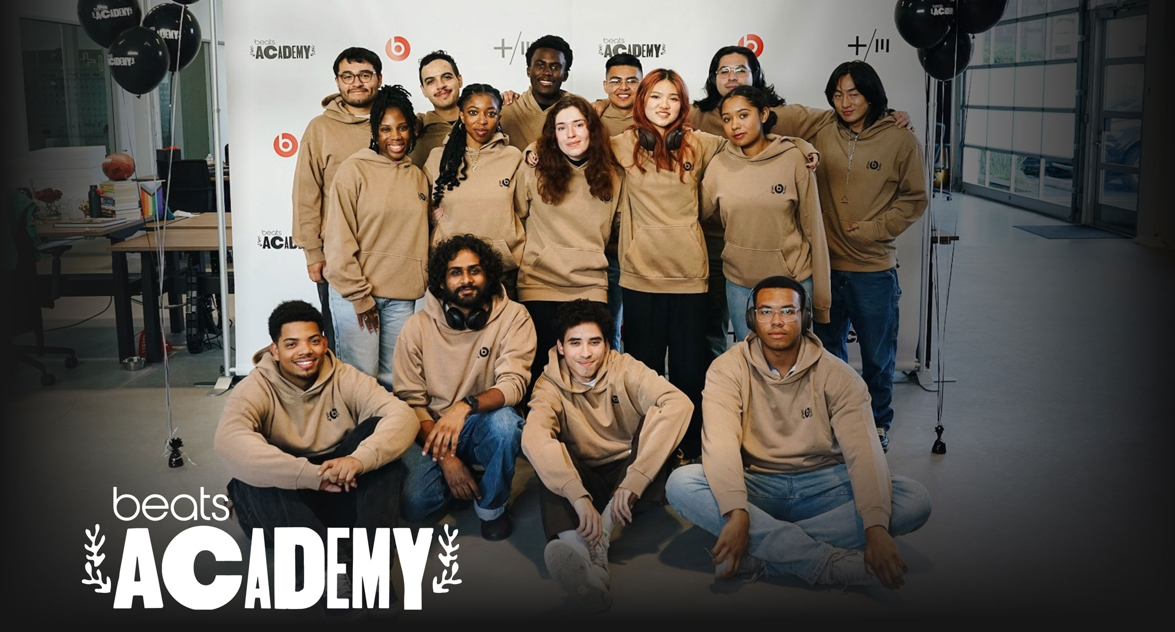 Beats Academy logo on hero banner featuring Beats Academy team photo