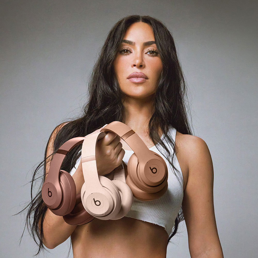 Kim Kardashian holding Beats Studio Pro headphones